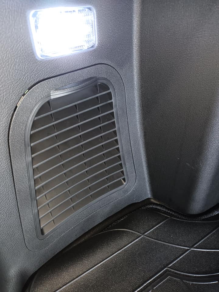Charging port access panel, closed