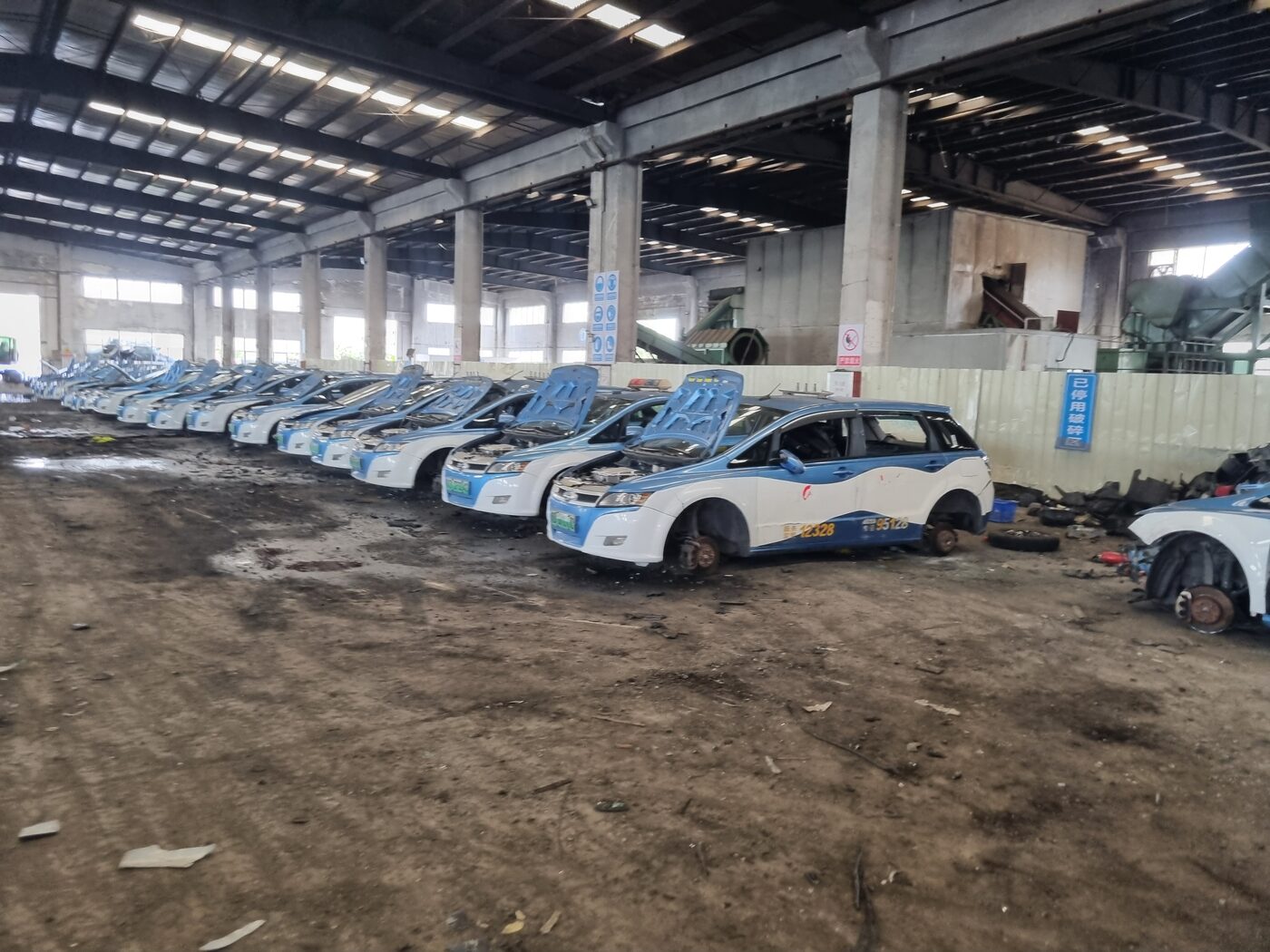 BYD e6 vehicles awaiting recycling in Shenzhen, China